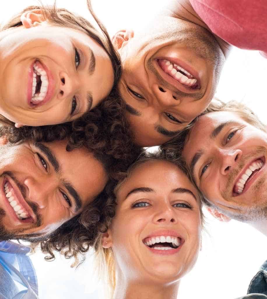 Smiling person showcasing white teeth after laser whitening treatment Telford